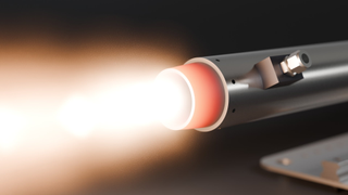 Simulated static fire: the nozzle glowing red with a supersonic plume exiting