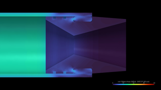 Section through the aft end of the chamber: von Mises stress in the tube, graphite nozzle and retaining ring at 350 psi